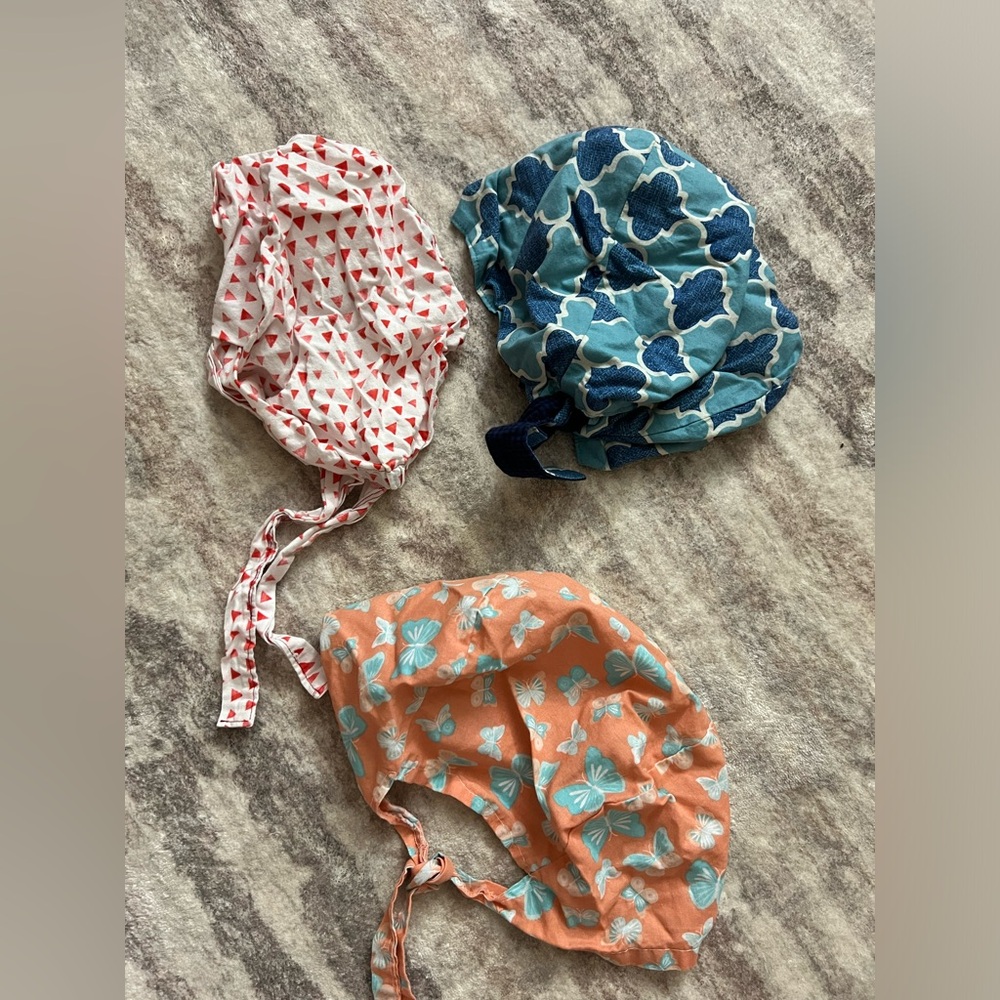 Three scrub caps
